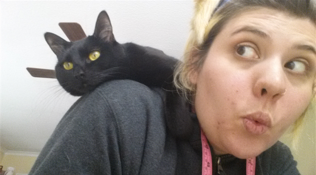 I really enjoy taking ridiculous selfies with my cats. This is Midna, btw.